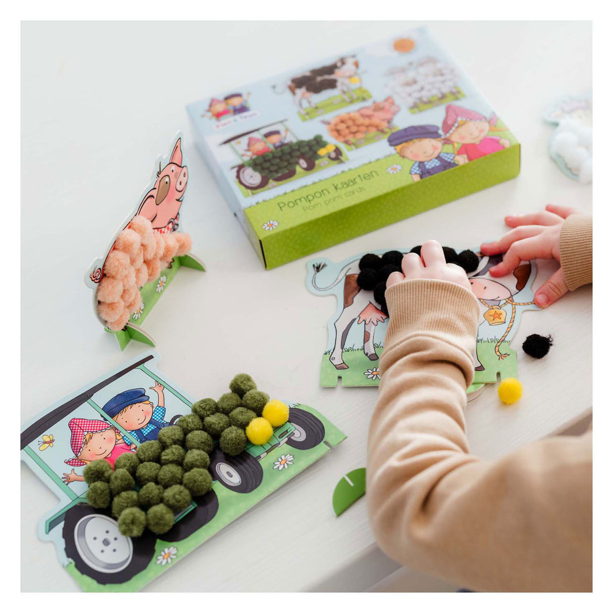 Bambolino toys fien en teun pompom plakken knutselset