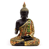Zwart oranje thaise boeddha meditatie