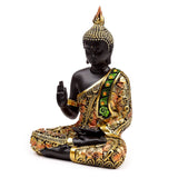 Zwart oranje thaise boeddha meditatie