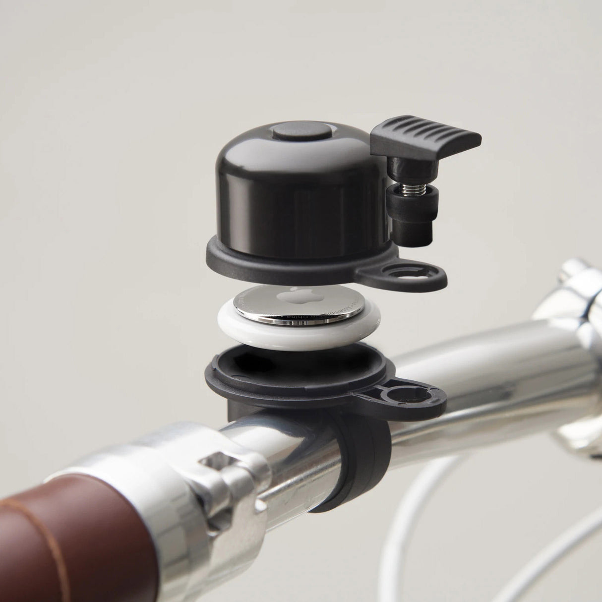 AirBell Fietsbel met Airtag houder ø31.8mm zwart