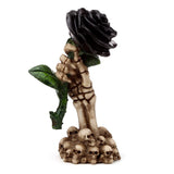 Skelet hand houdt zwarte roos woonaccessoire
