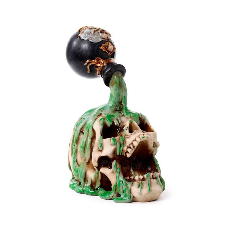 Schreeuwende schedel met groen drankje