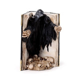 The reaper of death boek van schedels waxinelichthouder
