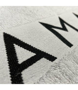 Farmavita amaro handdoek met logo